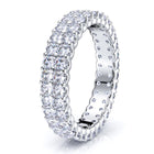 Curved wedding band paired with an engagement ring